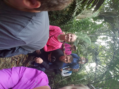 Jungle hike, students hiding behind their teacher for protection from wild boars