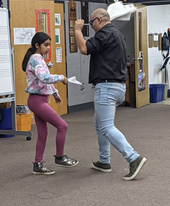 Amanda and Mr. Marquez dancing a traditional Chile dance
