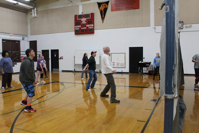 Playing Volleyball with Community Members